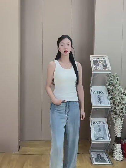 White ribbed tank top with chest support pads, casual layering style