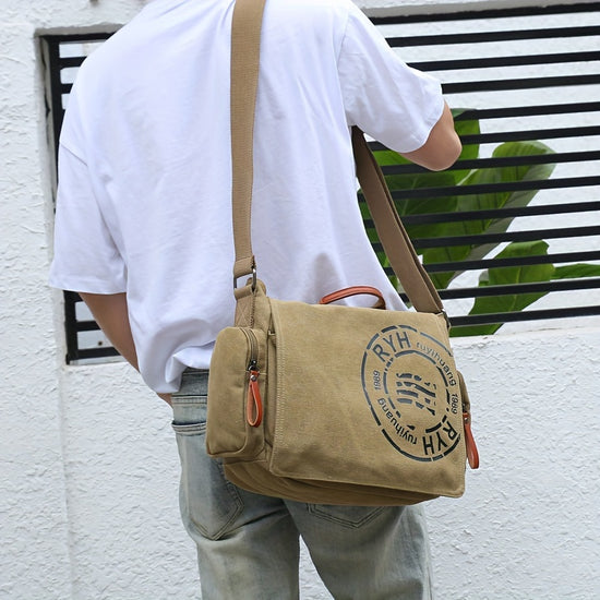 Flat-lay view of Montero Milan canvas messenger bag with detachable strap
